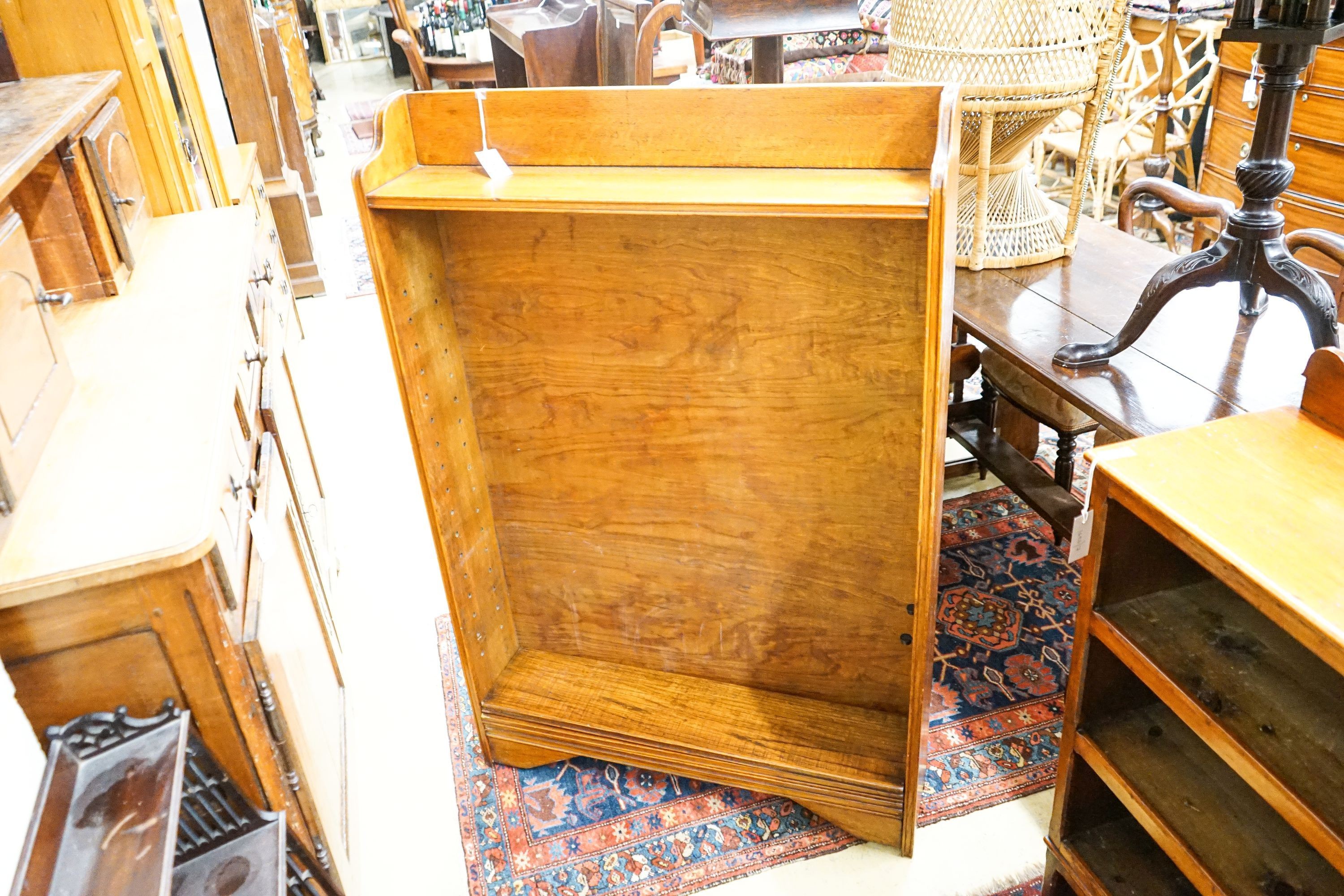 An early 20th century oak open bookcase, width 91cm, depth 20cm, height 140cm